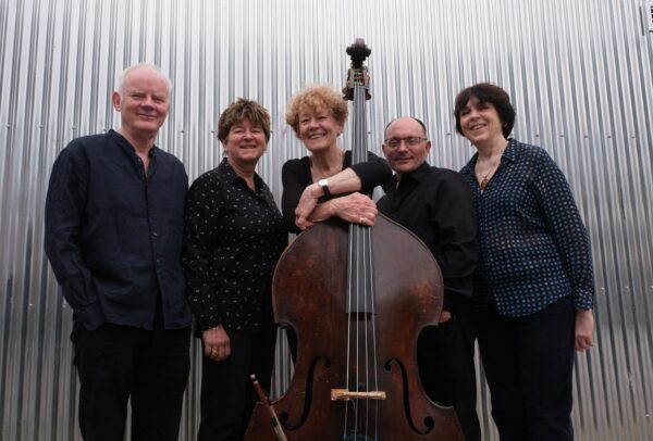 five members of the band with double bass