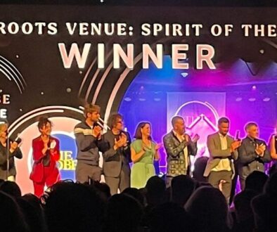 Finalists on clapping on stage